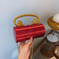 Elegant red metallic cylindrical evening bag with gold lion head handle and chain strap - Red