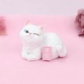 Cute white resin cat figurine with blue heterochromia eyes and a small pink sign - Electrify You (2D)