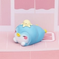 Close-up of cute blue penguin figurine with yellow octopus hat for desk decor - Penguin Carrying Octopus Style (Style C)