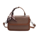 Brown canvas crossbody bag with leather trim and geometric patterned silk scarf handle - Coffee