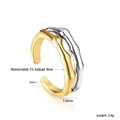 Detailed macro of two-tone adjustable ring with organic texture and 18k gold plating - Mixed Gold and Silver Irregular Wave Style (RI134207M)
