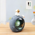 Detail of creative astronaut moon lamp showing resin moon crater texture and mini space pilot - Gray Moon Green Planet (Style B)