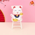 Lucky cat car ornament with golden ingots on a white chair, traditional Chinese decor - Sitting on Chair Lucky Cat (C)