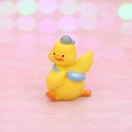 Cute yellow duck figurine with a grey baseball cap and blue crossbody bag accessory - Mini Yellow Duck with Grey Hat and Blue Bag