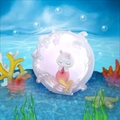 Cute rabbit mermaid night light with warm pink glow in an ocean coral scene - Pink Sea Elf Bunny