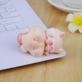 Pink sleeping resin pig figurine in white dress on laptop keyboard for office desk decor - Pink Sleeping Style (2D)