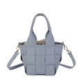 Borsa a secchiello intrecciata azzurra in pelle con manico e inserto a coulisse - Blu