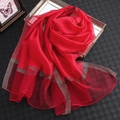 Elegant solid red silk scarf with silver sequins and translucent chiffon texture - Red