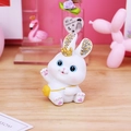 Cute white bunny figurine with crystal crown and cross-body bag for desk decoration - Type B Diamond-studded Crown Rabbit Ornament / As Shown