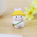 Cute resin bunny desk ornament with yellow sun hat and carrot bag on wood surface - Kindergarten Youyou Bunny