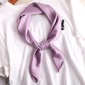 Elegant purple silk satin square scarf displayed on a white tee and wooden hanger - 70*70cm / Purple