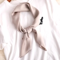 Elegant champagne satin silk scarf for women shown tied on a classic white t-shirt - 70*70cm / Beige Khaki