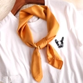 Elegant golden silk square scarf with a smooth glossy finish on a white T-shirt - 70*70cm / Orange