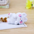Cute white resin bunny figurine with pink sakura paw patterns for desktop decor - Lying Pose (A Nana)