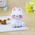 Cute white bunny figurine with pink flower details for car or desk decoration - Naughty Sitting Pose (B Chacha)