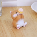 Cute Shiba Inu car ornament holding a pink drink cup, made of resin in brown and white - Shiba Inu Style