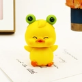 Cute yellow duck figurine wearing a green frog hat for car dashboard decor - Squinting Yellow Shaking Head Duck (0032)