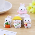 Miniature resin rabbit figurines in four cute poses with carrot and flower accessories - Youyou Bunny Mini Set of 4