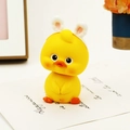 Cute yellow duck figurine wearing white bunny ears headband for car dashboard decor - Open-eye Yellow Shaking Head Duck (0032)