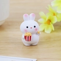 Cute miniature resin bunny holding popcorn tub for desktop and car dashboard decor - Popcorn Youyou Bunny