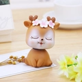 Cute nodding deer car dashboard ornament with pink flower crown in soft lighting - Closed Eyes - Brown