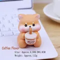 Cute orange Shiba Inu figurine holding coffee cup for desk or car dashboard decor - Coffee Dog Style