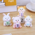 Set of four cute resin animal figurines holding miniature drinks for desk decor - Vitality Cute Creature Ornaments