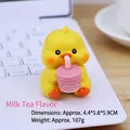Cute yellow chicken figurine holding bubble tea cup for car and desk decoration - Milk Tea Duck Style