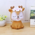 Cute fawn money bank in brown finish with floral head decor on a wooden desk - 2A Brown Deer Large Size Closed Eyes