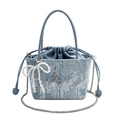 Light blue denim bucket bag with silver sequins, pearl bow charm, and chain strap - Blue
