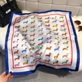 Detailed view of the dachshund print square scarf with vibrant colors on soft plush surface - 65cmx65cm / Navy Blue