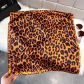 Classic leopard print silk-like square scarf in bright orange and brown for women - Caramel color
