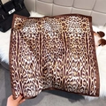 Classic leopard print square silk scarf in earth tones with smooth satin texture finish - Coffee Brown