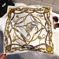 Flat lay of vintage chain print silk scarf with luxury accessories on white plush background - White / 65*65cm
