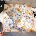 Floral print silk scarf with champagne border styled on plush background with accessories - 65*65cm / Ginger Yellow (W-546)
