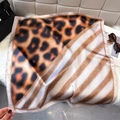 Detail of leopard and stripe print square silk scarf with elegant satin sheen and textures - 65*65cm / Caramel Brown