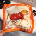 Macro shot of silk scarf detailing vintage horse print and orange border on fur background - 65*65cm / Orange Red
