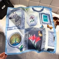 Elegant floral art silk scarf displayed with luxury accessories on a soft plush background - 65*65cm / Sky Blue