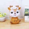 Cute yellow deer piggy bank with white floral crown on a minimalist wooden desktop - 4B Brown Deer Small Size Open Eyes