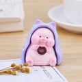 Cute pink pig resin figurine wearing a purple hoodie and holding a chocolate donut - Purple Hoodie with Donut Style