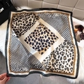 Detailed view of leopard and zebra print silk square scarf on luxury textured backdrop - 65*65cm / Black (W-556)