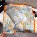 French tropical rainforest print silk square scarf with orange borders on faux fur background - Orange