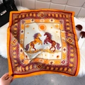 Luxurious horse print silk-like square scarf in orange and yellow with elegant sun motifs - Orange