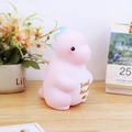 Pink dinosaur piggy bank with blue fins and Sweet Heart gold print for kids - Milky Pink