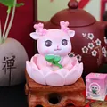 Pink cartoon deer figurine sitting in a lotus flower base for zen desktop decoration - Deer With Lotus (C Style Deer)