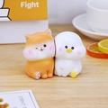 Cute resin cat and duck mini figurines on a wooden desk for home or office decor - Shiba + Duck Ornaments (Set of 2)