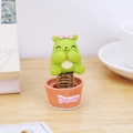 Cute green bear spring ornament with pink bow on a desk for office decor - Bear With Bow Spring Ornament (0541B)
