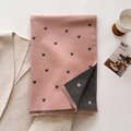 Detail of double-sided heart pattern scarf with soft cashmere-like texture and fringe edges - 185x65cm / Peach