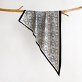 Elegant geometric silk scarf with chain pattern hung on natural wood branch - Light Blue (SJ-28)