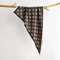 Detail of vintage geometric silk scarf hanging on a wooden branch with soft lighting - Black (SJ-31)